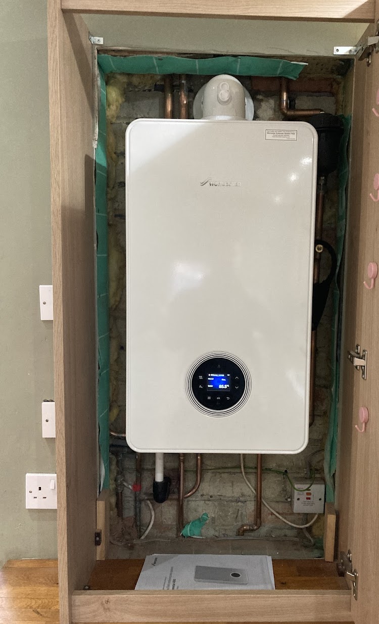 Worcester boiler in cupboard by Redleaf Heating